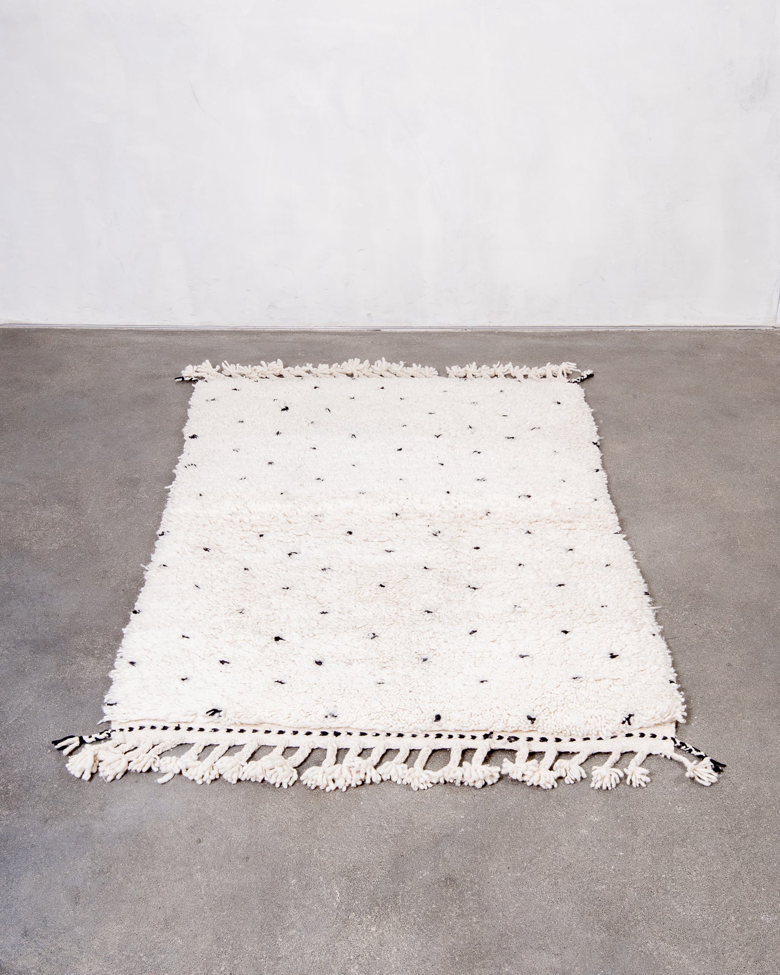 Modern, designer, handcrafted Berber rug from Morocco. Beniourain carpet with beautiful colours and patterns and fluffy wool texture.